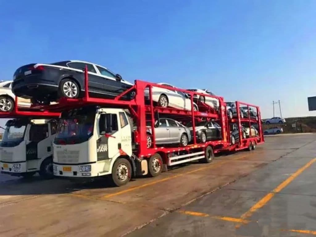 Car carrier lorry loaded with vehicles on the way to the port