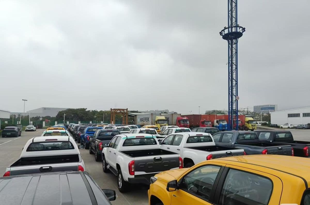 Rows of vehicles waiting in a port yard